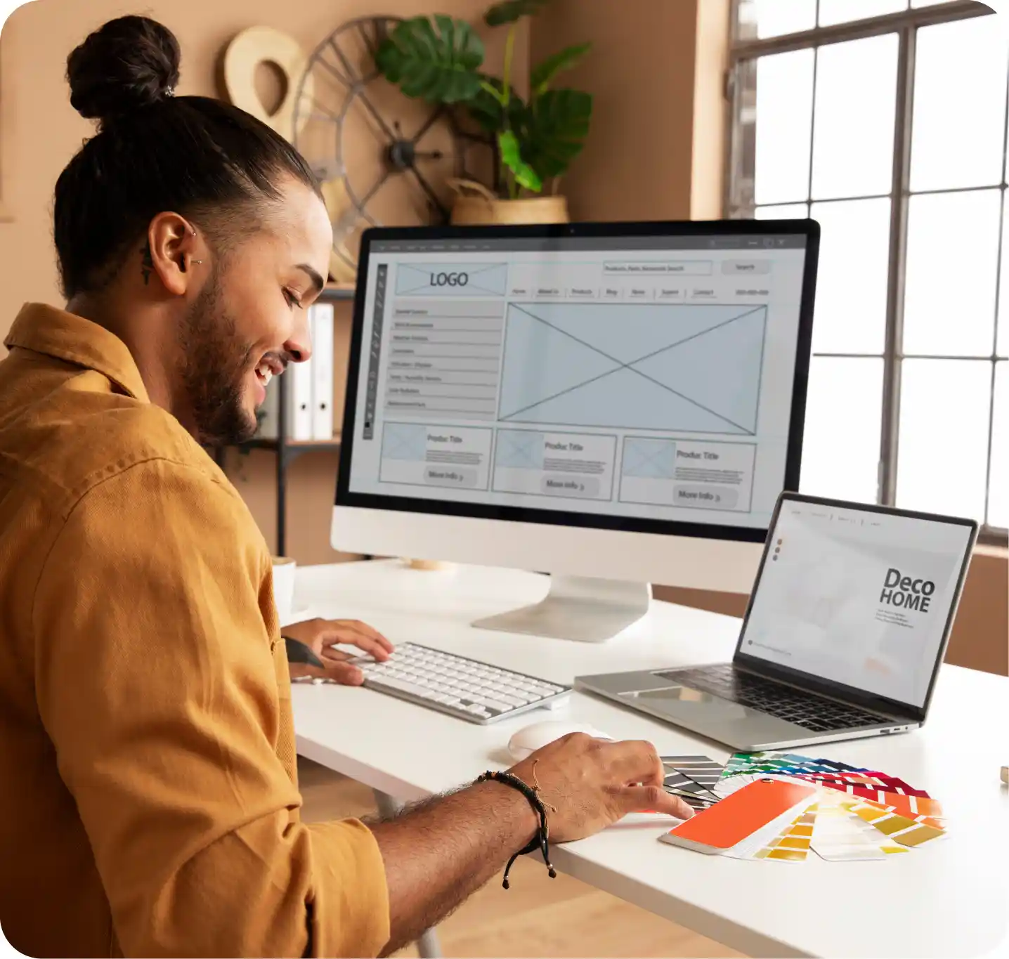 Young couple smiling at laptop